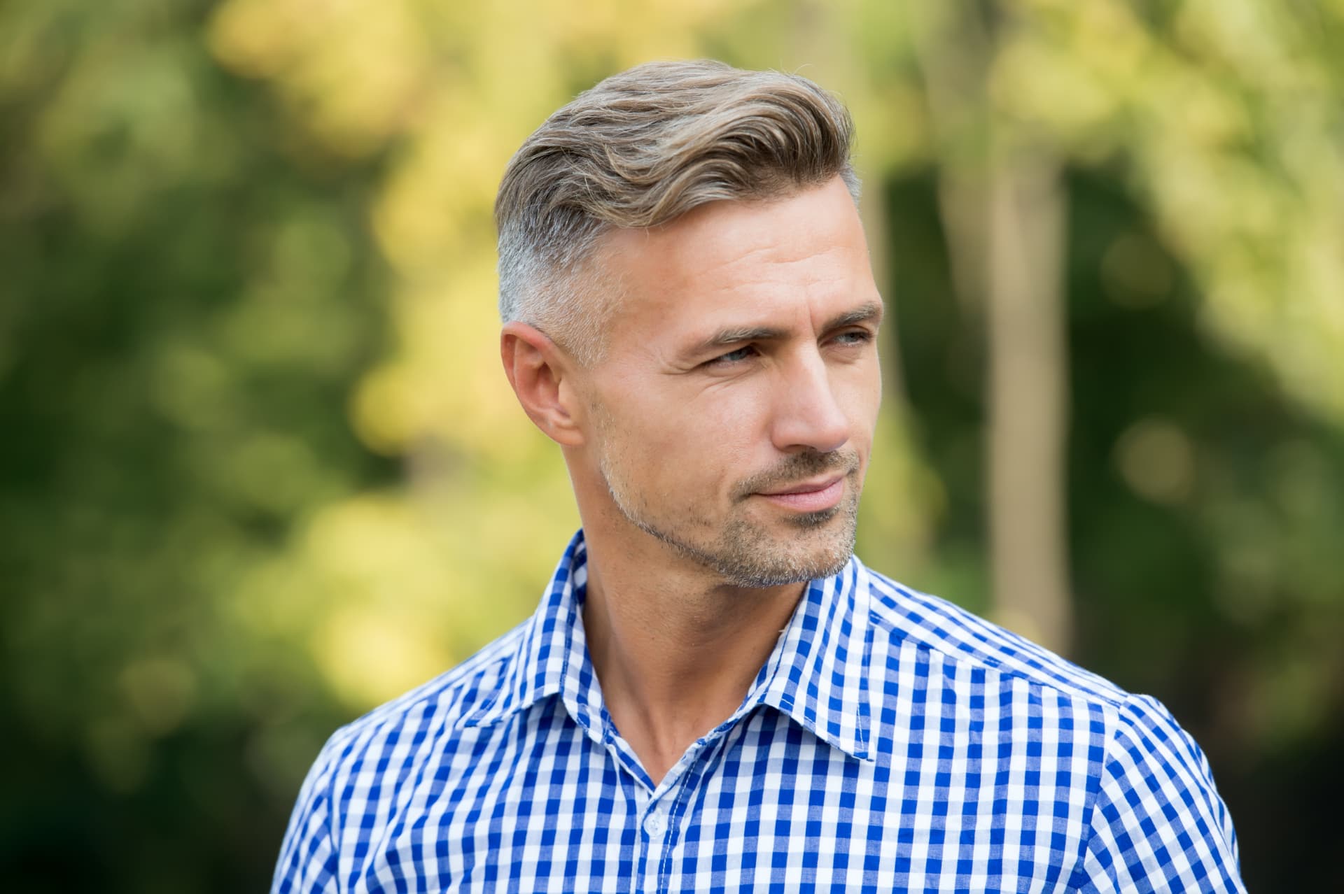 Man wearing a natural-looking premium men's hair system